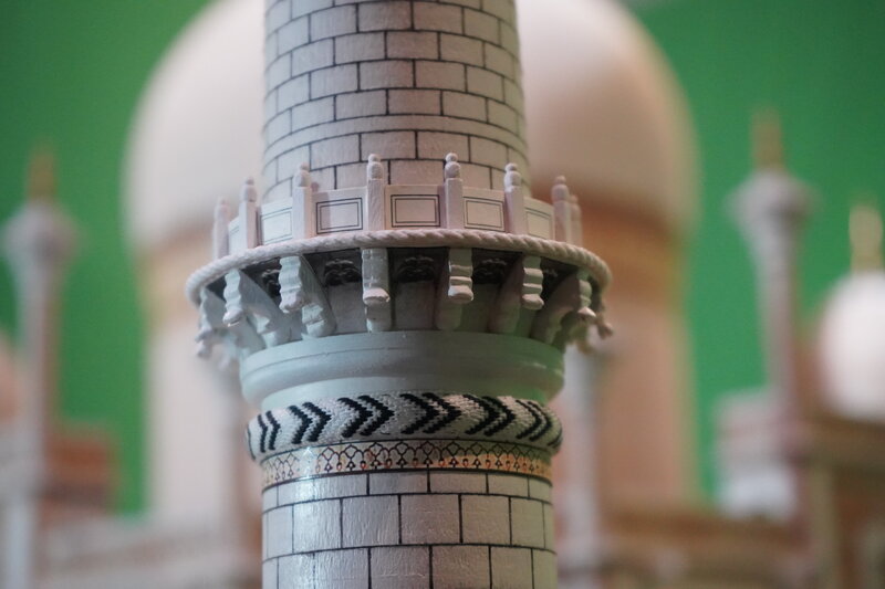 Minaret balcony detail showing hand-cut chevron pattern