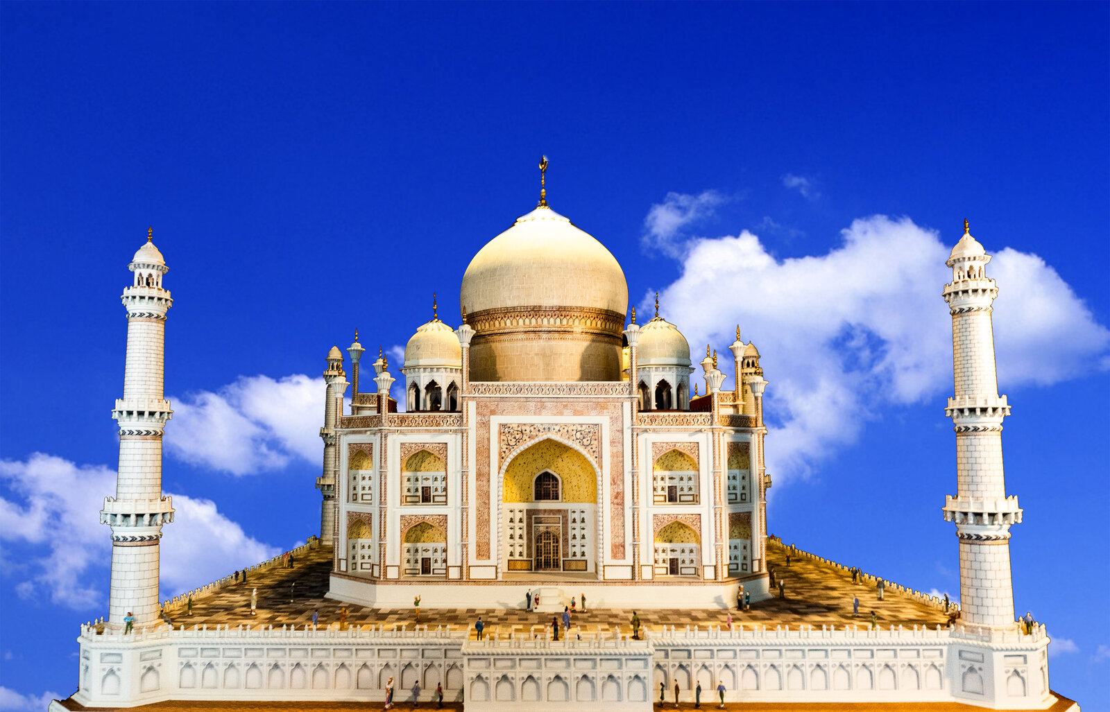 Handcrafted wooden Taj Mahal model against blue sky